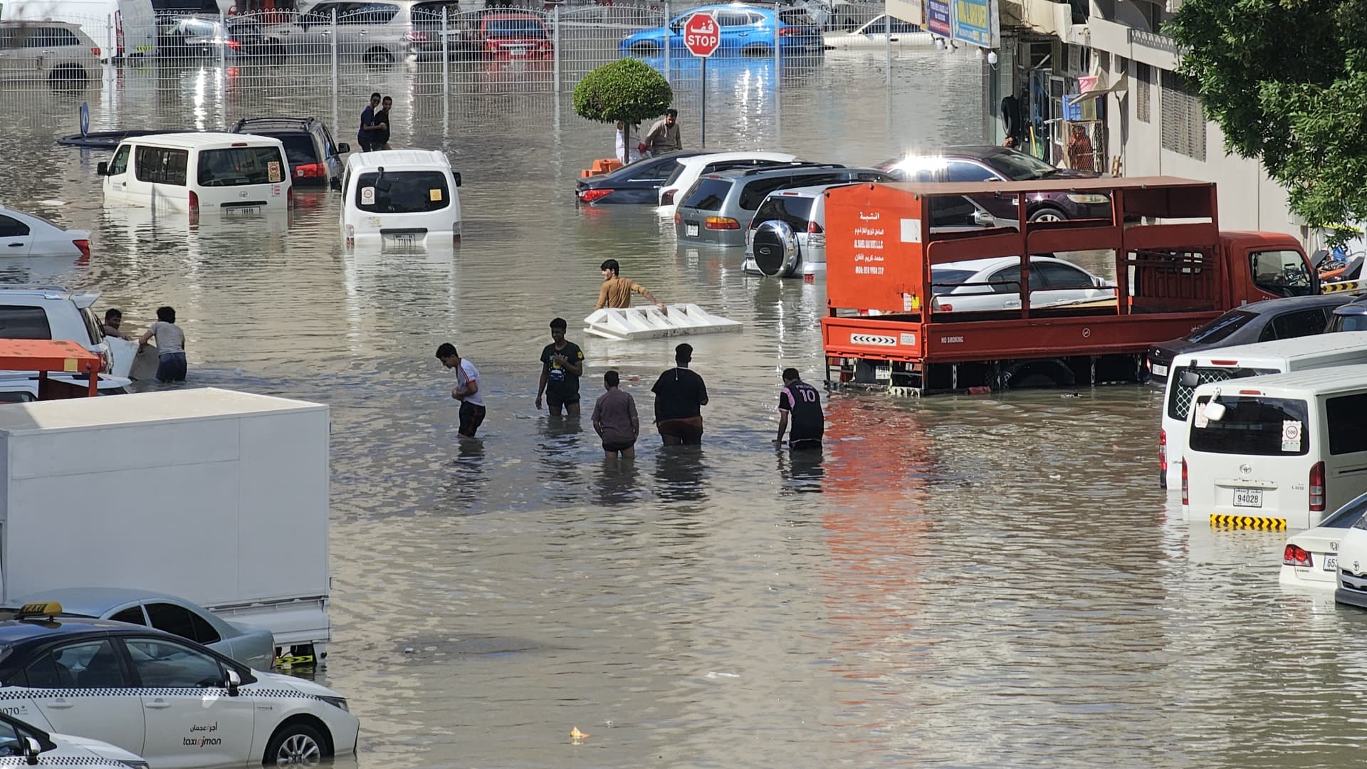 A view of submerged cars at a street after heavy rainfall in Dubai, United Arab Emirates on April 17, 2024.