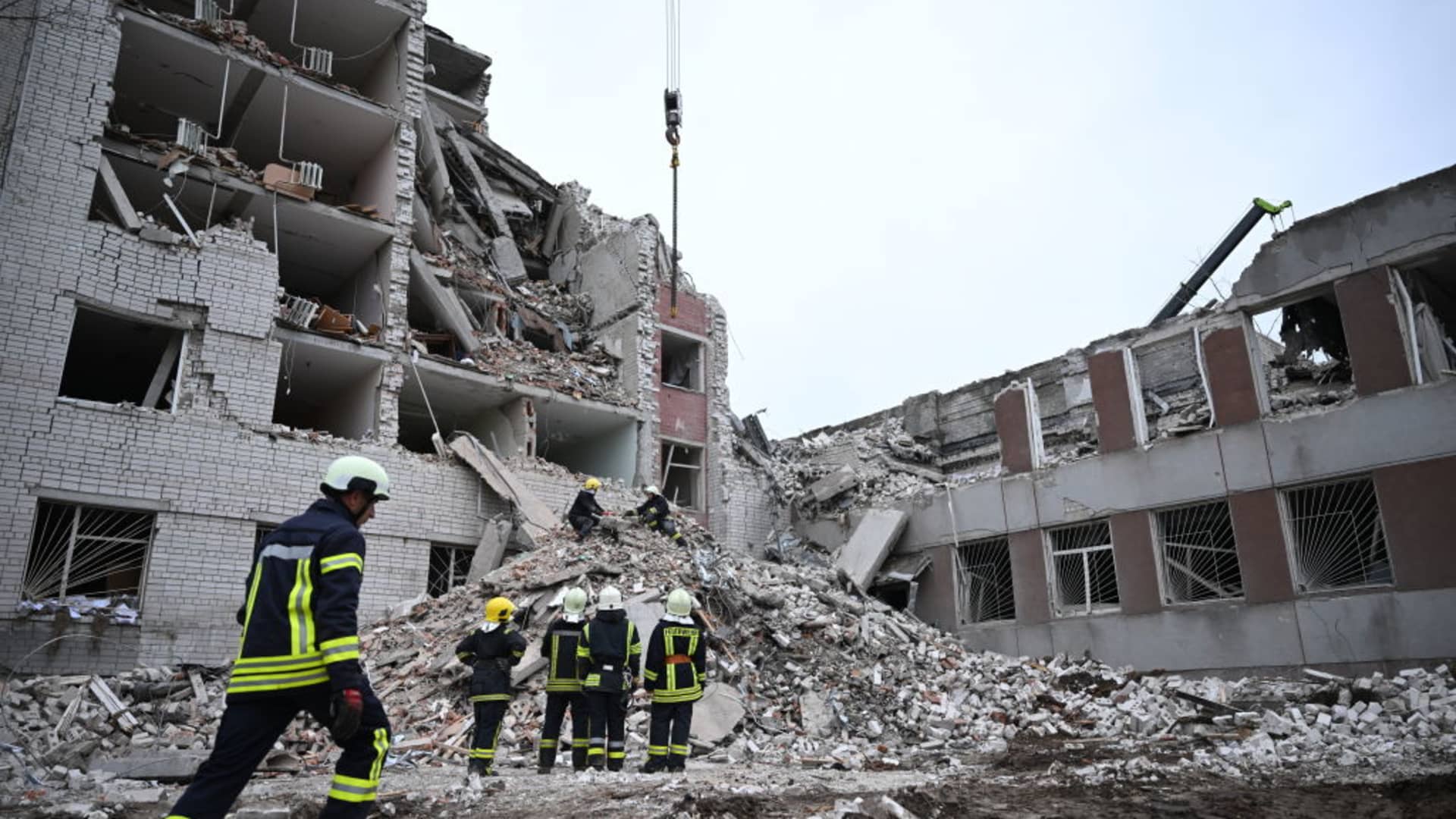 Firefighters conduct operations in the rubble of heavily damaged building, part of which collapsed, following the Russian missile attack on Chernihiv, Ukraine on April 17, 2024.