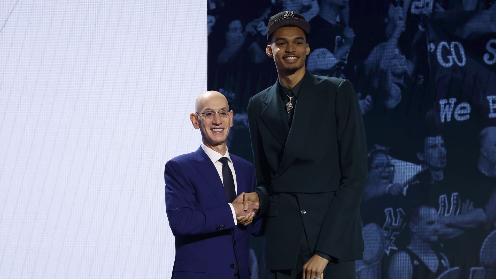 Victor Wembanyama poses with NBA commissioner Adam Silver after being drafted first overall by the San Antonio Spurs during the first round of the 2023 NBA Draft.