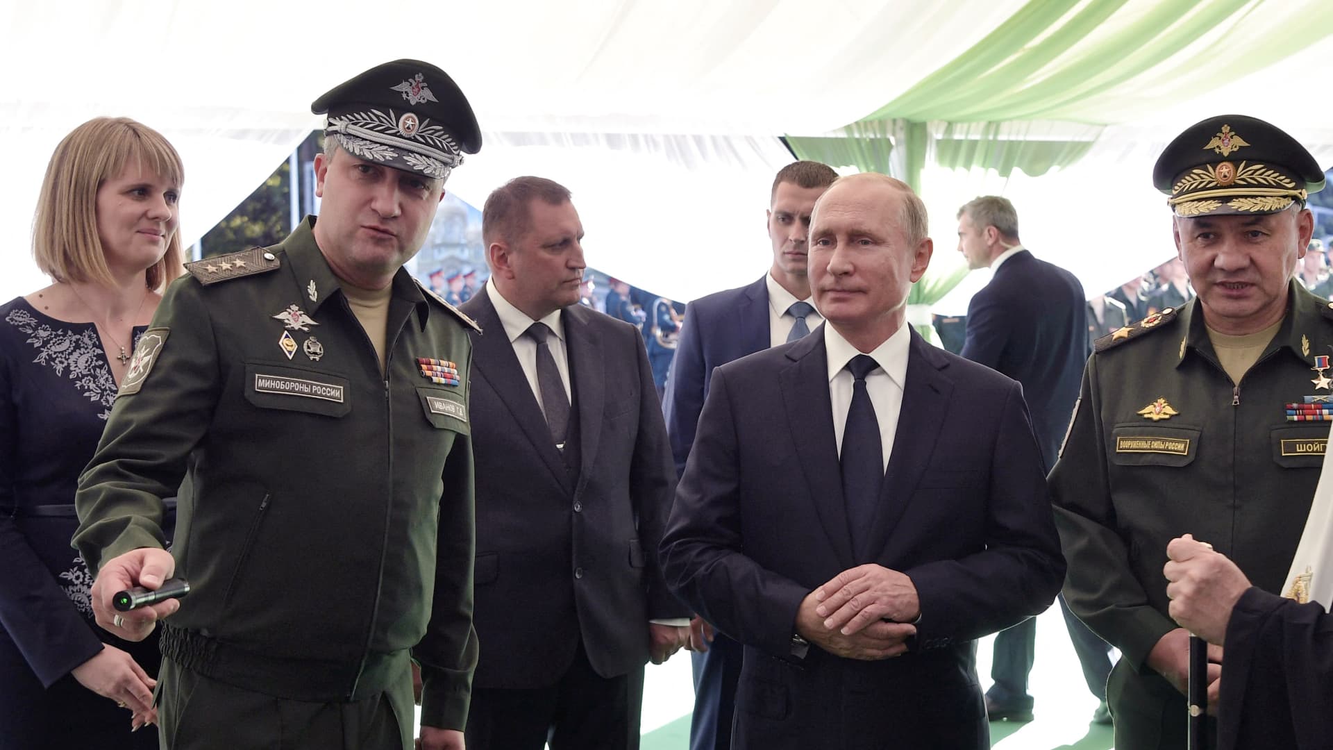 In this pool photograph distributed by Russian state owned agency Sputnik, Russia's President Vladimir Putin (C), Russian Defence Minister Sergei Shoigu (R) and Deputy Minister of Defense of the Russian Federation Timur Ivanov (L) visit the military Patriot Park in Kubinka, outside Moscow, on September 19, 2018. Russian law enforcement have detained Deputy Defence Minister Timur Ivanov on suspicion of taking bribes, Russia's Investigative Committee said on April 23, 2024. 