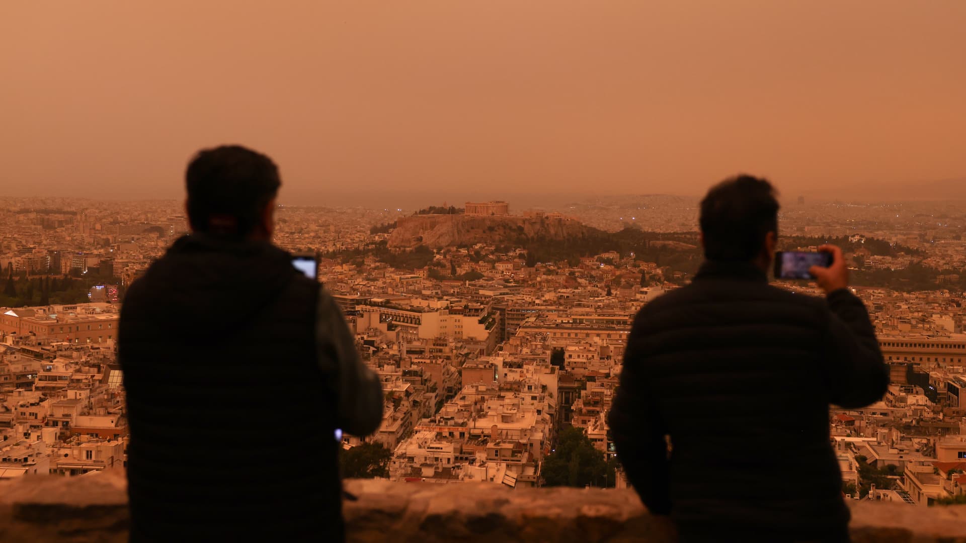 Dust from the desert of Sahara covers the city in orange haze in Athens, Greece on April 23, 2024.