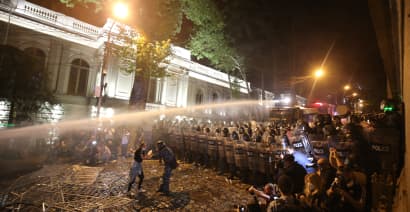 Police use tear gas and water cannons on 'foreign agent' bill protesters in Georgia