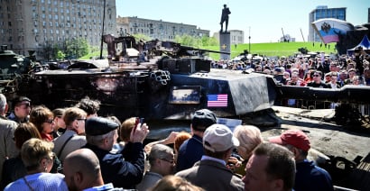Russians flock to see NATO hardware seized in Ukraine; Moscow to beef up weapons, front line forces