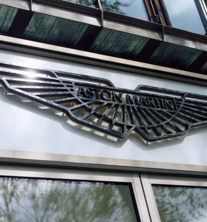 Luxury carmaker Aston Martin slumps 6% as losses nearly double