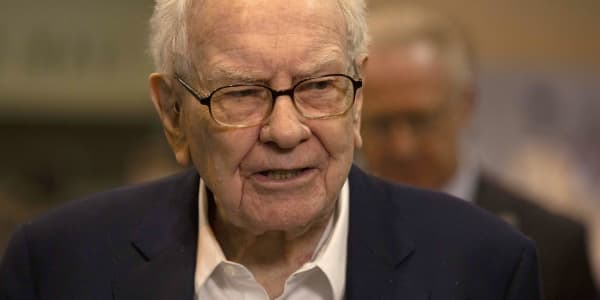 Berkshire cuts Apple investment by about 13%, Buffett hints that it's for tax reasons