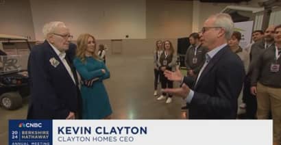 Kevin Clayton on the floor Berkshire Hathaway Annual Meeting with Warren Buffett