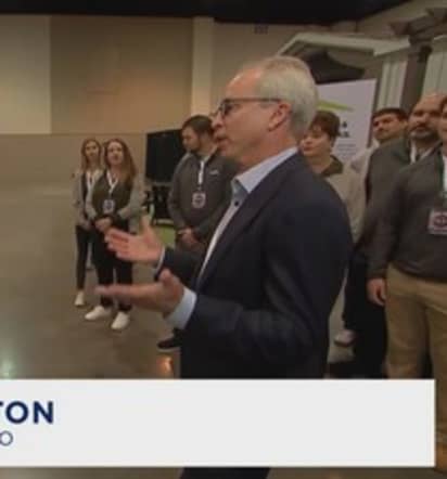 Kevin Clayton on the floor Berkshire Hathaway Annual Meeting with Warren Buffett