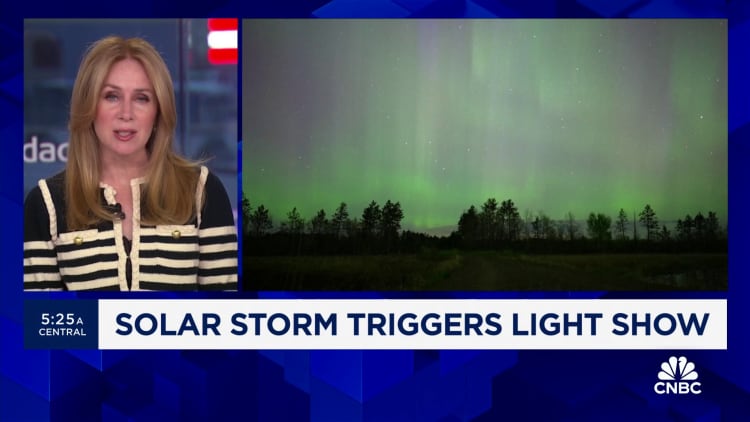 Solar storm triggers light show
