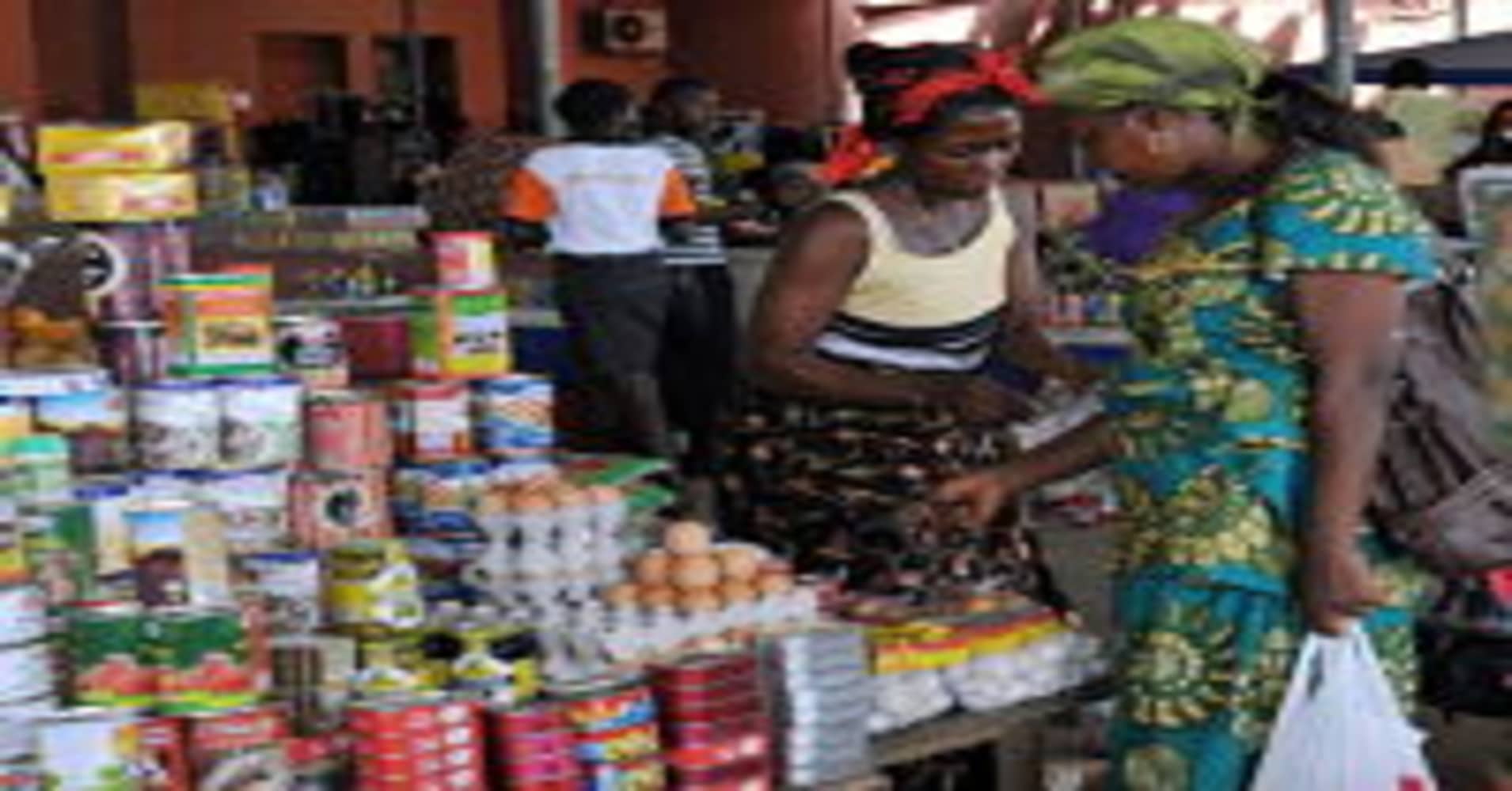 An Angolan woman shops in a market in Cabinda.