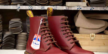 Dr. Martens shares plunge to all-time low, trading briefly halted on weak outlook