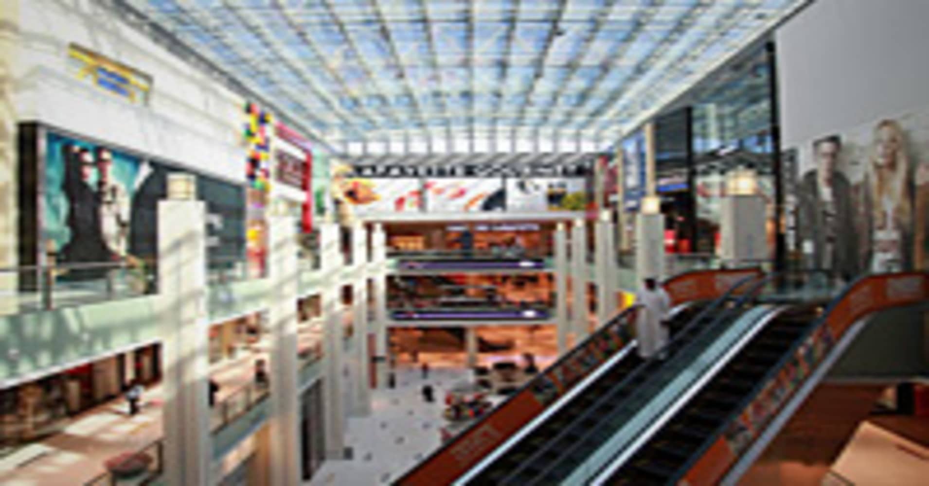 Stores are seen surrounding an atrium inside the Dubai Mall.