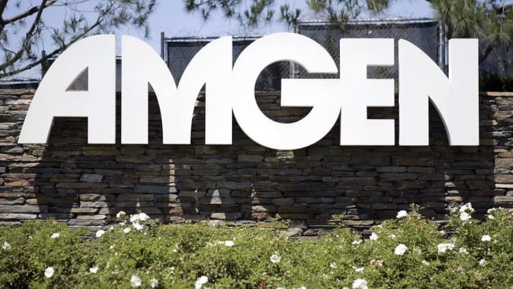 Gilead beats EPS expectations by $0.10; Amgen raises low end of full-year revenue outlook