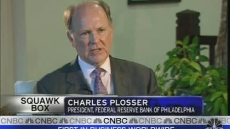 Fed's Plosser: Premature to Consider Rate Hikes
